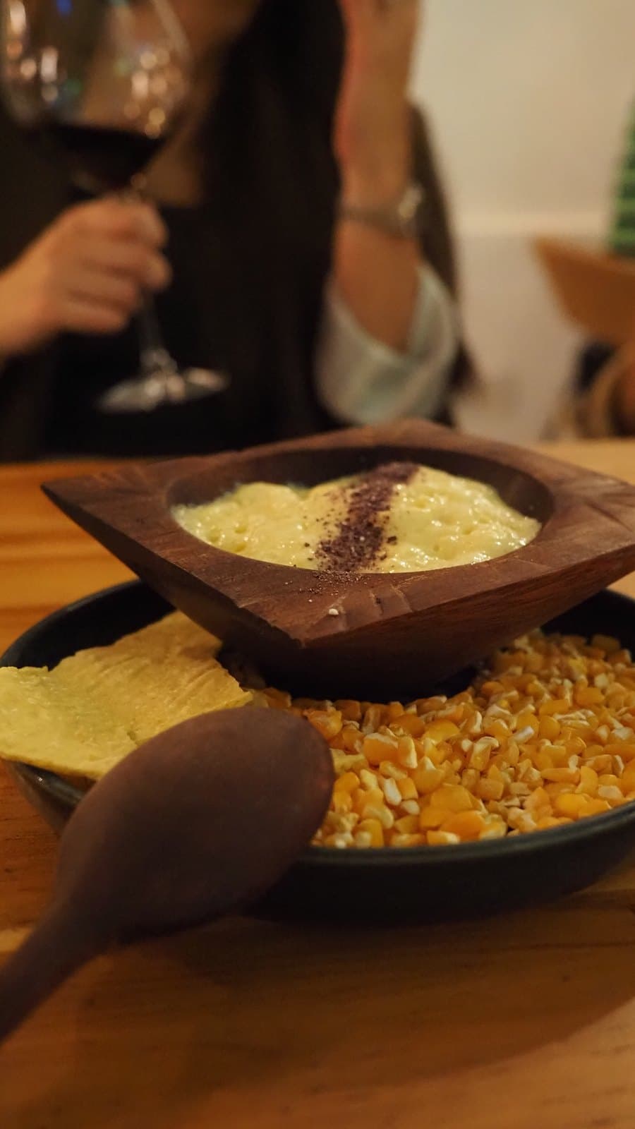 Coconut rice served in a carved wooden bowl at Kaandela, Casco Viejo