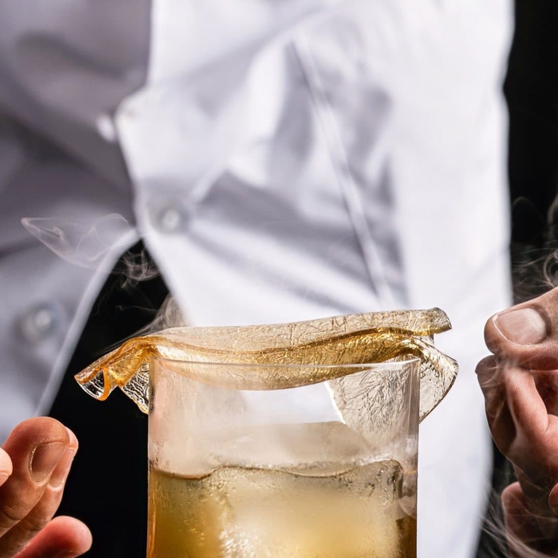 The Smokey Rum cocktail being poured at Azahar's bar