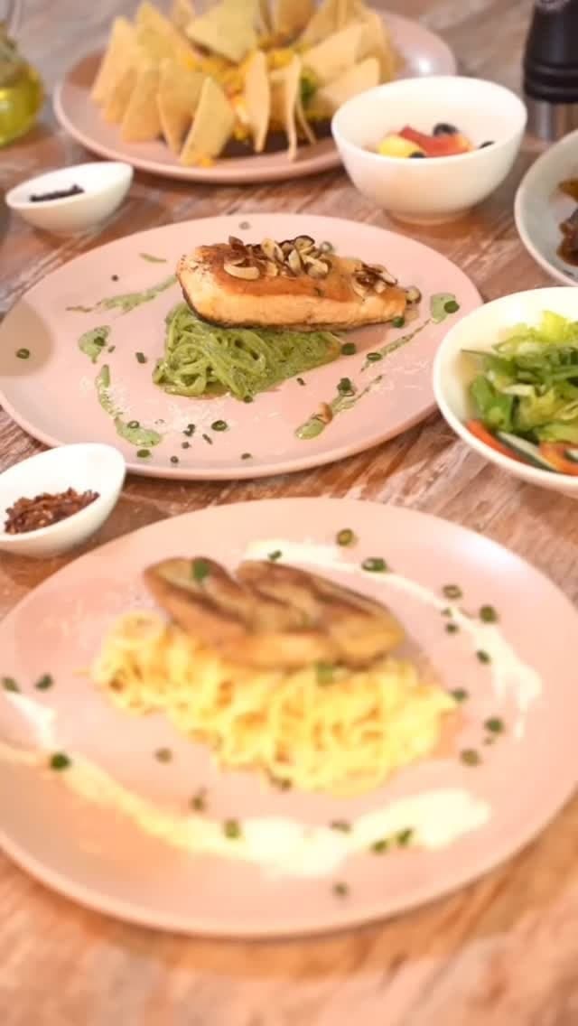Brunch dishes plated on al·alma's signature pink plates in Casco Viejo, Panama City