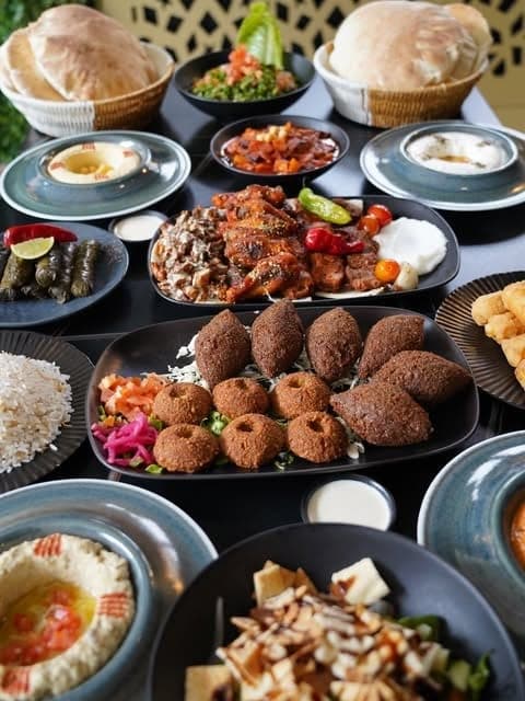 Lebanese mezze spread with hummus, kibbeh, grape leaves and pita at Al Basha, Bella Vista, Panama City