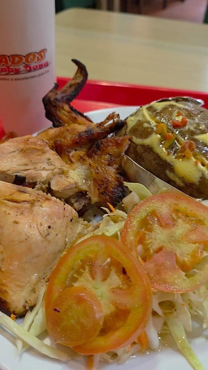 Roast chicken plate at Asados Gaby Dana, Bella Vista, Panama City