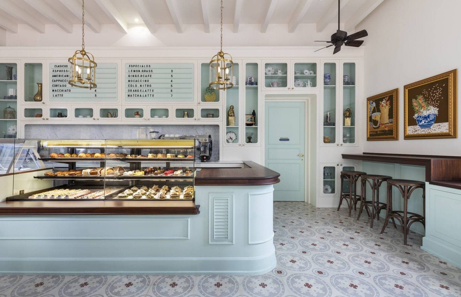 Pastel-mint pastry counter and coffee menu board at Café Vera, Casco Viejo, Panama City