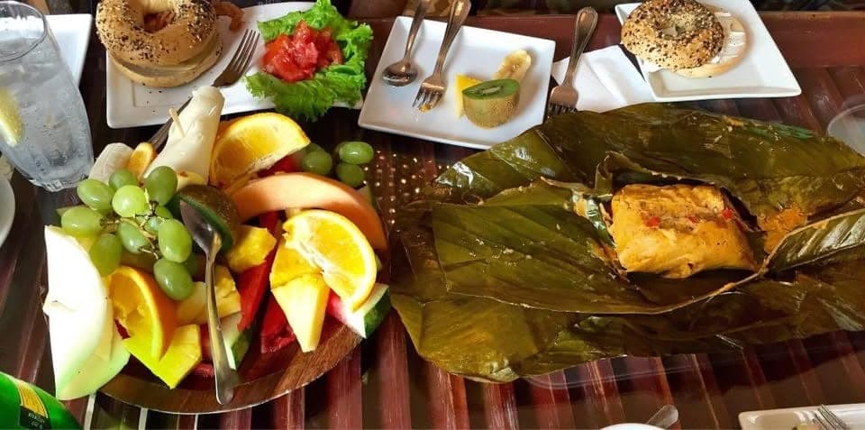 Brunch spread with bagels, fruit platter and a tamal at Casa Sucre, Casco Viejo, Panama City