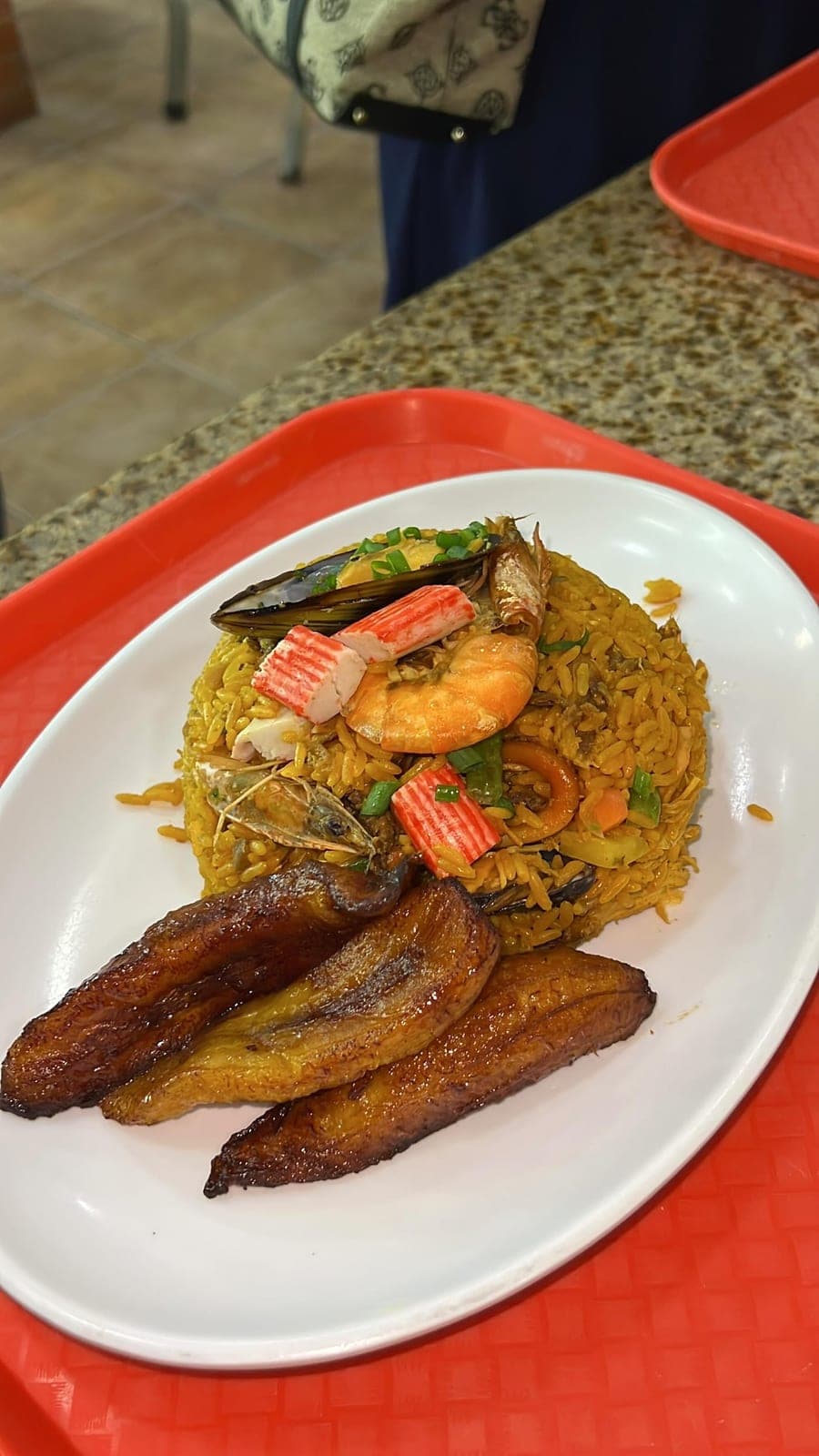 Seafood rice with fried plantains at Cholo Grill, El Cangrejo, Panama City