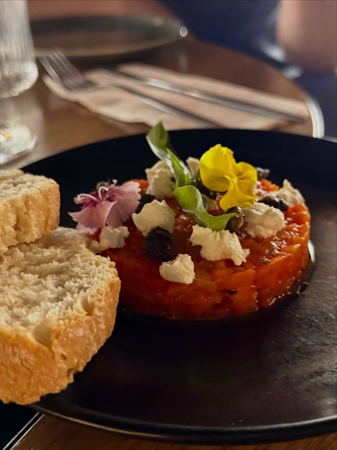 Tomato and red-pepper tartare with goat cheese and bread at Corcho wine bar, Casco Viejo, Panama City