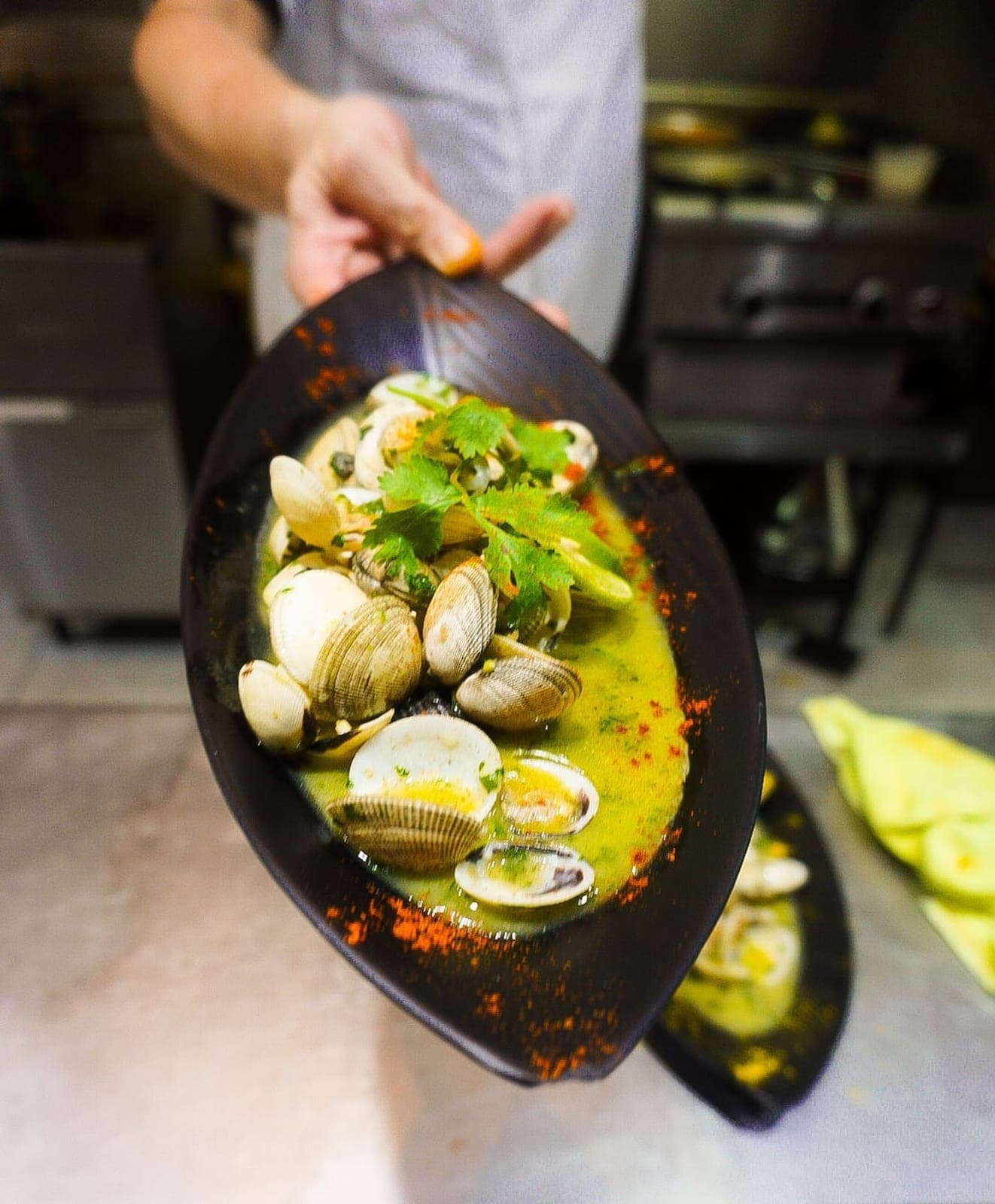 Clams in green cilantro-garlic broth at Costa Mar, Avenida Balboa, Panama City