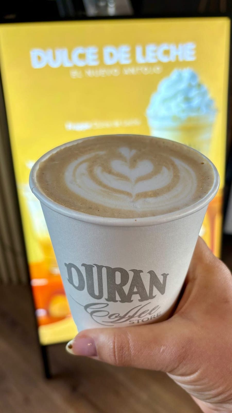 Latte with latte art at Durán Coffee Store, La Plaza Ciudad del Saber, Clayton, Panama City