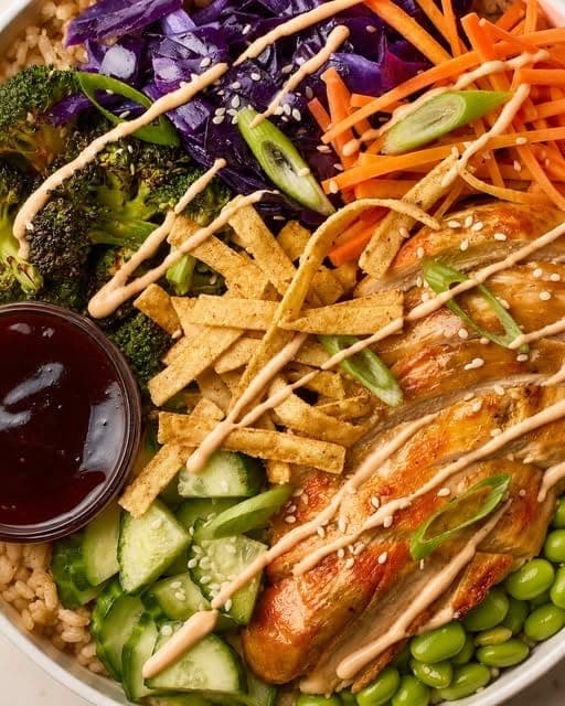 Teriyaki chicken rice bowl with broccoli, edamame and crispy wonton strips at Freshii, Bella Vista, Panama City