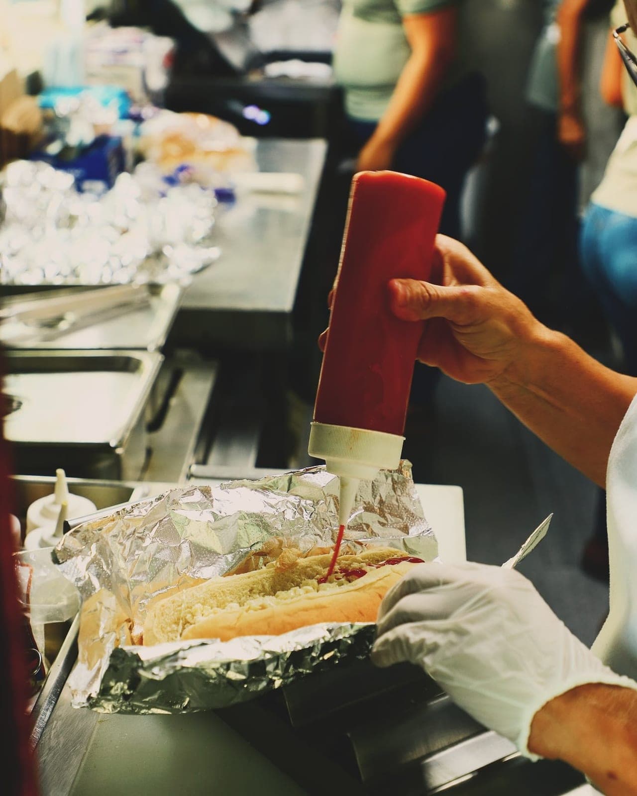 Hot dogs being prepared at Hotdogstop, Chanis / Costa del Este, Panama City