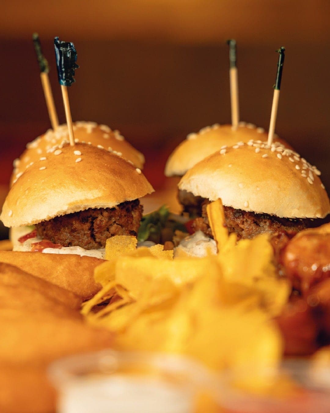 Platter of mini burgers with plantain chips and wings at La Fábrica, Casco Viejo, Panama City