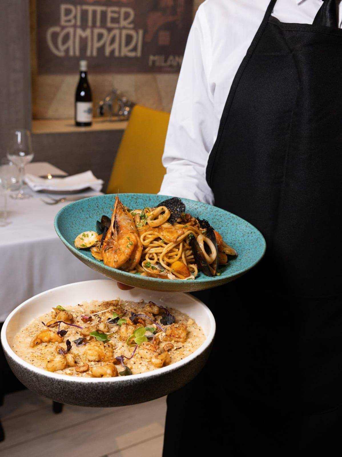 Seafood pasta and shrimp risotto at La Vespa Trattoria, Panama City