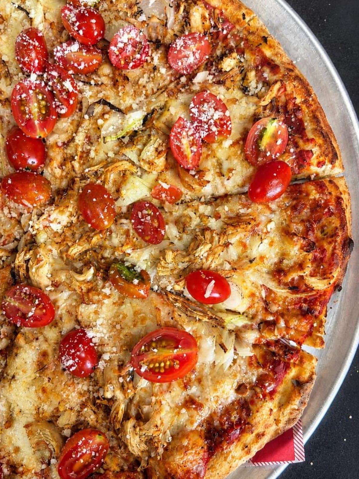 Pizza with cherry tomatoes at Pizzarella, Costa del Este, Panama City