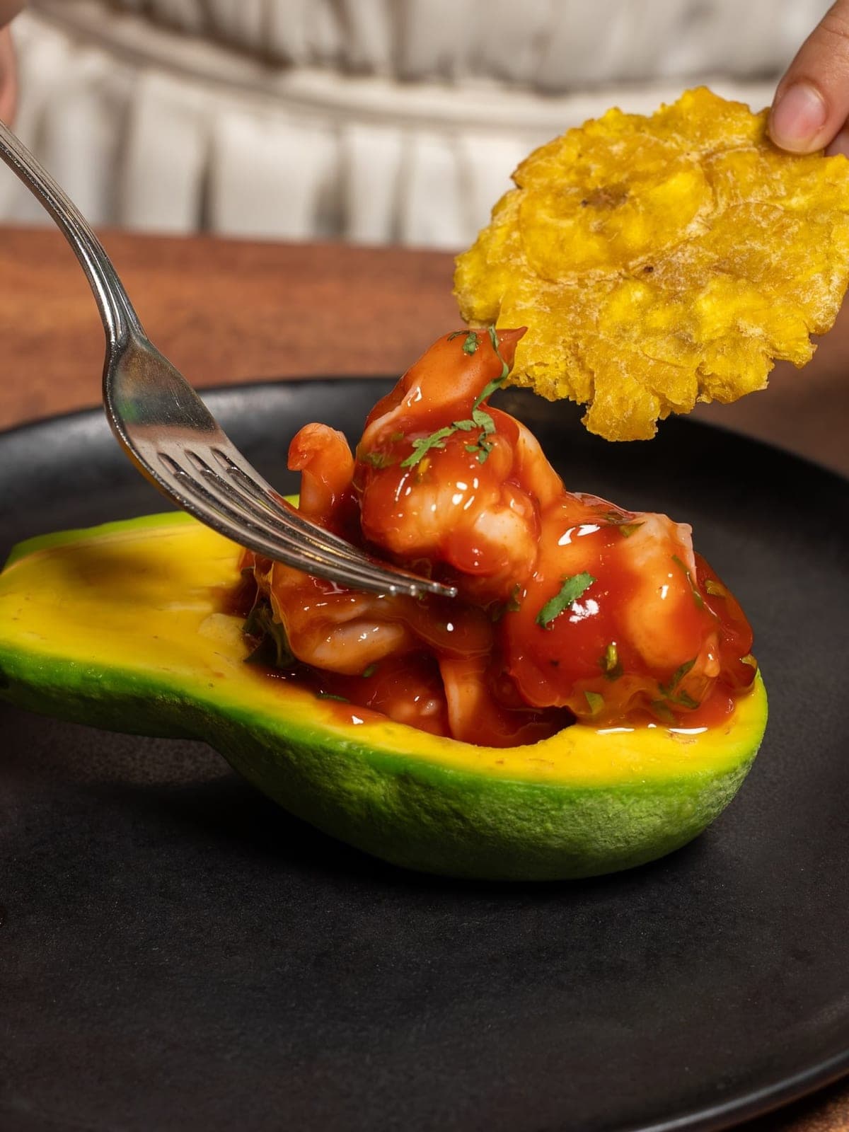 Ceviche cartagenero served in avocado at La Papa, Town Center Costa del Este, Panama City