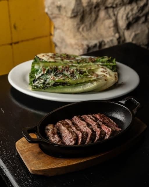 Grilled steak and charred romaine at Tasca La Candelaria, Casco Viejo, Panama City