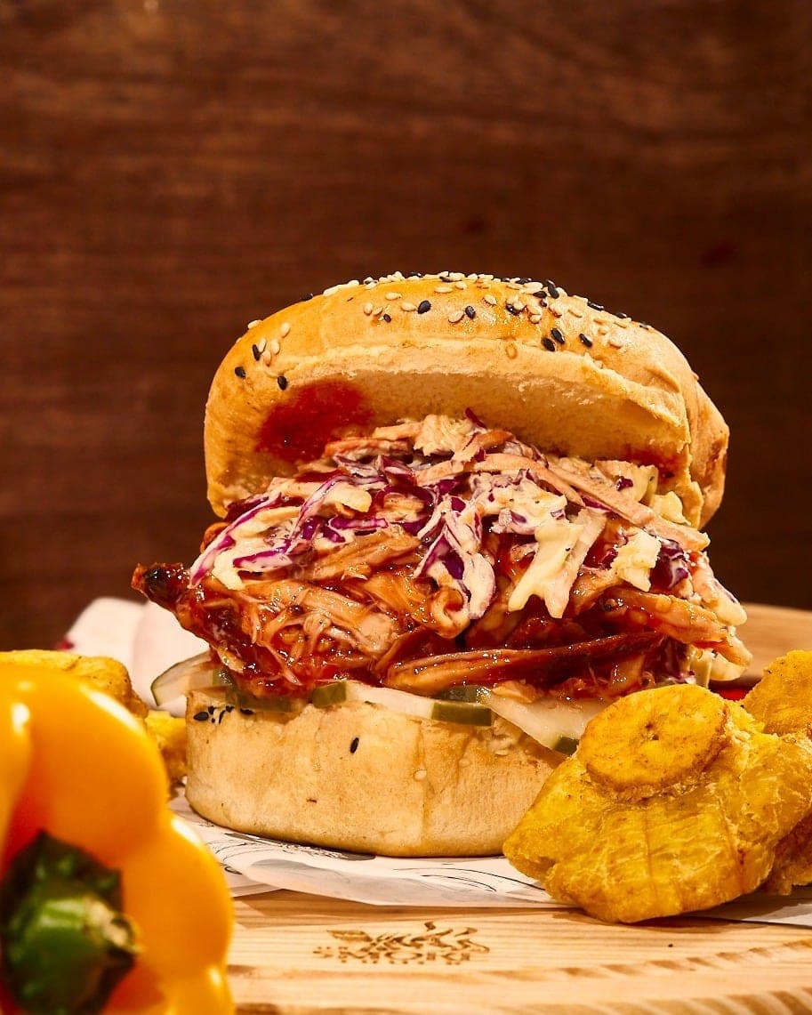 Pulled pork sandwich with coleslaw and plantain chips at The Smoke Truck, San Francisco, Panama City
