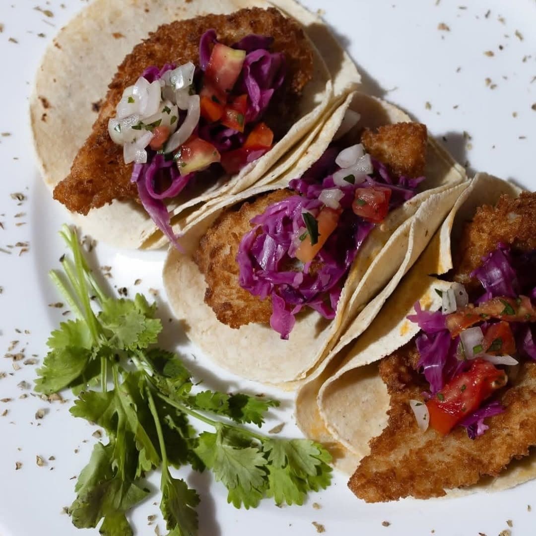 Crispy fish tacos with cabbage slaw and pico de gallo at Walk-A-Mole, Obarrio, Panama City